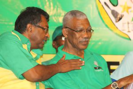 AFC Leader, Khemraj Ramjattan (left) and Chairman of the People’s National Congress-dominated A Partnership for National Unity, David Granger.
