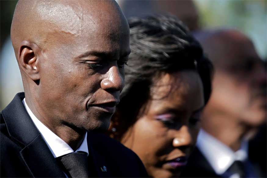 President of Haiti, Jovenel  Moïse standing next to his wife Martine  Moïse