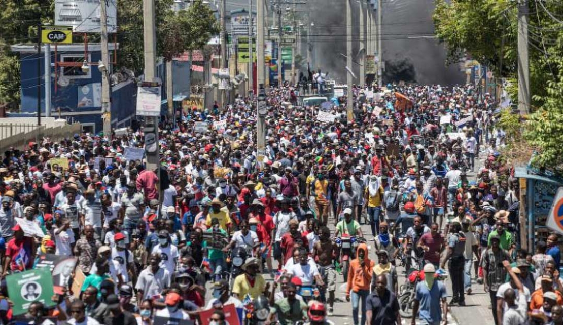 Haitians demonstrate during a protest to denounce the draft constitutional referendum proposed by President Jovenel Moise, on March 28 in Port-au-Prince.