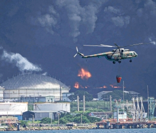 CUBA | Call Me! Washington's Refrain of Generosity, while Cuba’s oil storage tank burns