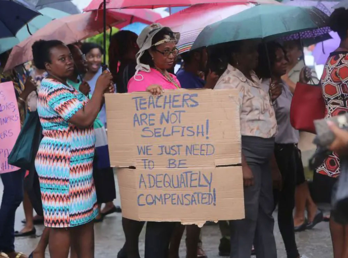 GUYANA | Roysdale Forde stands with Guyana’s Teachers