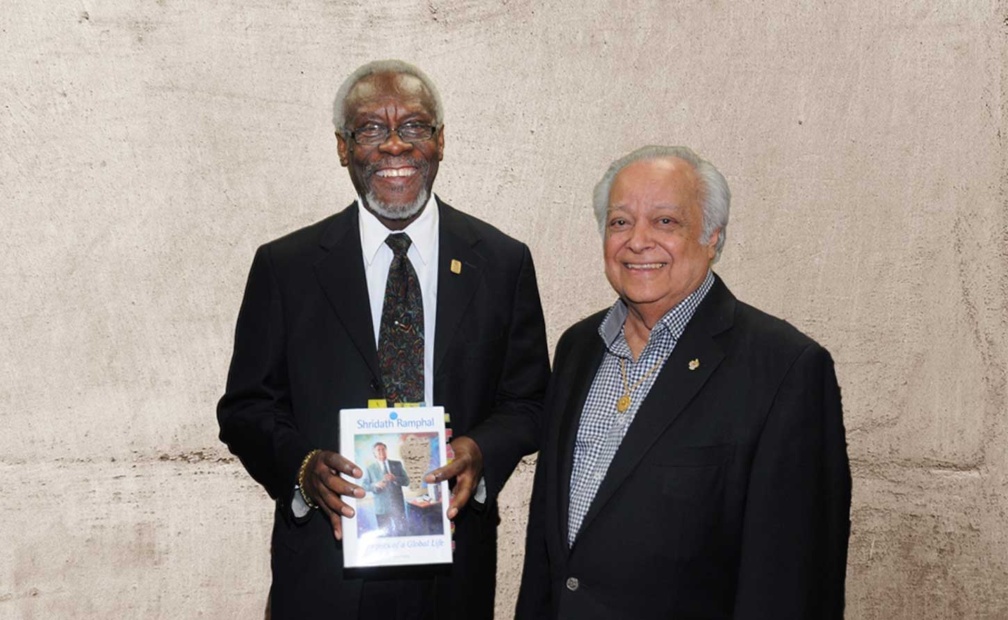 Former Prime Minister P.J. Patterson and Sir Shridath at his book launch at the UWI Mona Campus.