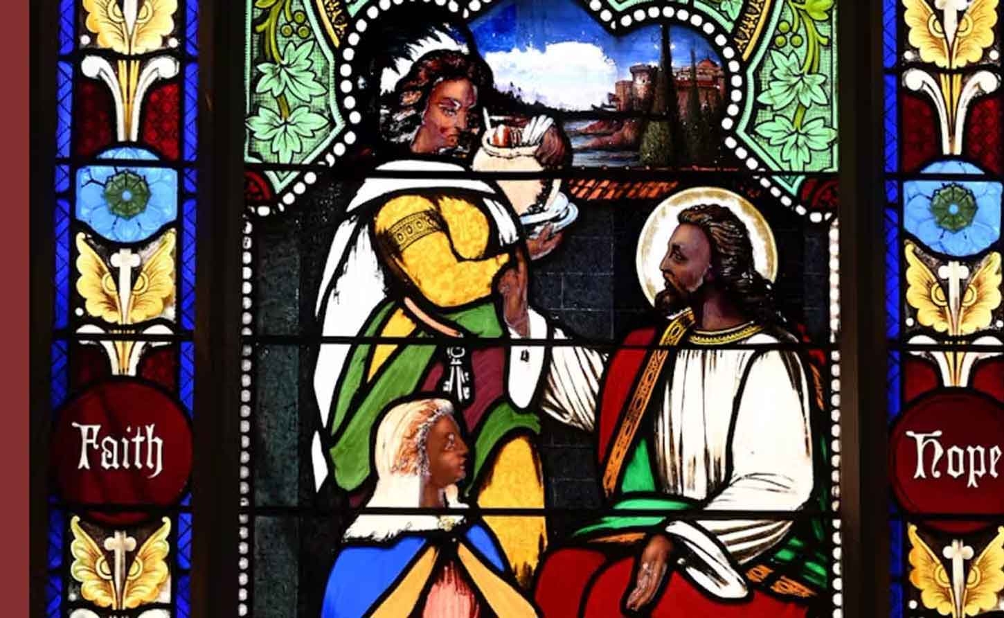 A stained-glass window that was part of a church shows a dark-skinned Jesus, which was unusual at the time. Michel M. Raguin