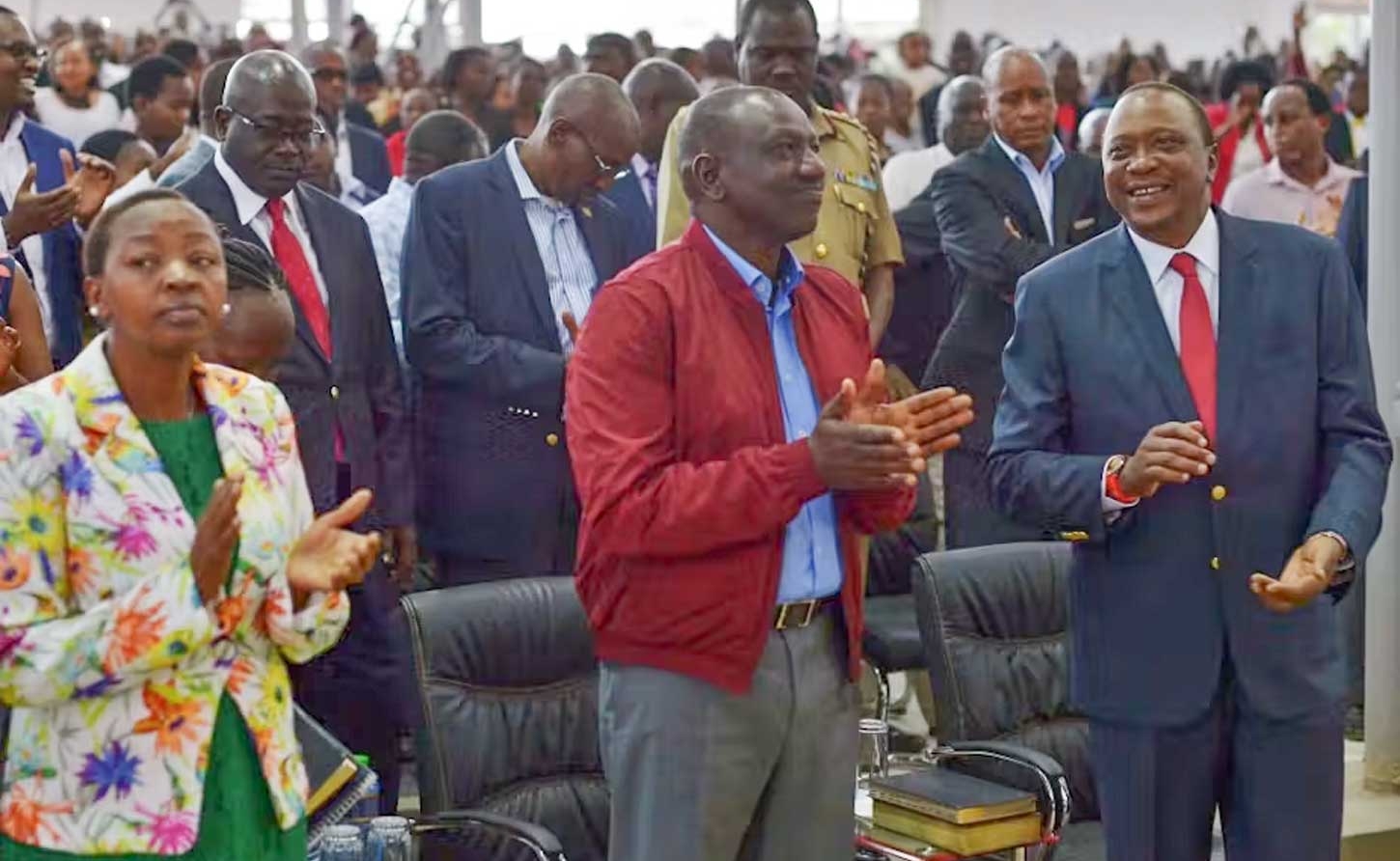 President Uhuru Kenyatta (right) and his deputy, William Ruto (centre) attend a pentecostal religious service in Nairobi in 2017. Photo by Tony Karumba/AFP