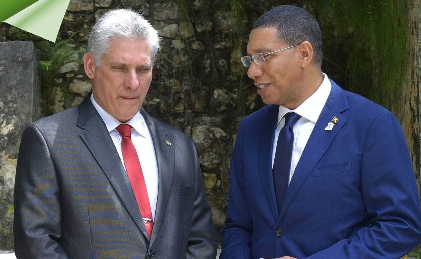 Prime Minister Andrew Holness (right), speaks with President of the Republic of Cuba, Miguel Díaz-Canel Bermúdez