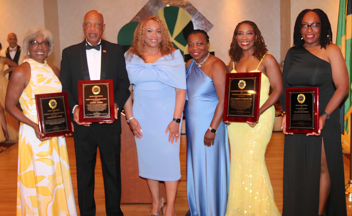 Mayor of Highland Park Elsie Foster (3rd from left) and President Jamaica Organization of New Jersey  JON-J Board of Trustees Valerie Bailey, are flanked  from left by  awardees Jacqueline Lewis, Lynval James, Dr. Karren Dunkley, and Elaine Matthews (Photo by Derrick Scott)