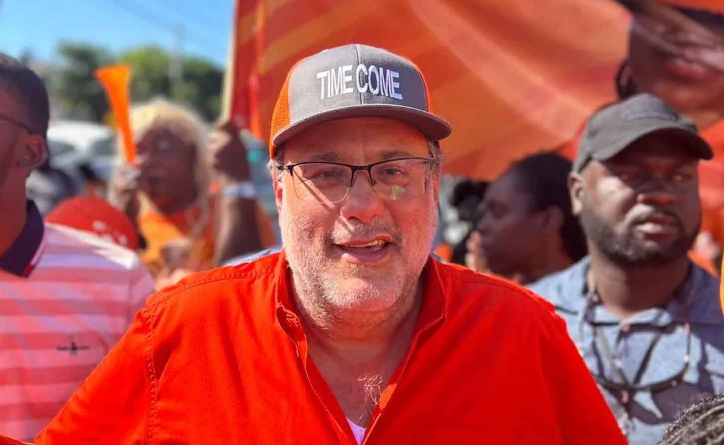 PNP President Mark Golding on his way to the nomination centre on Monday to confirm his candidacy.