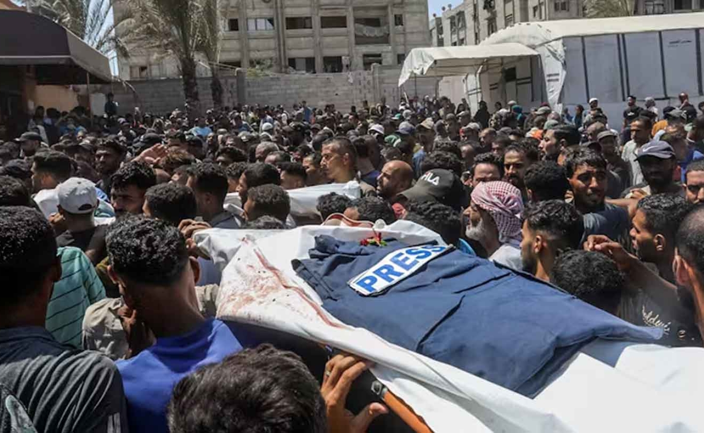 A funeral ceremony takes place in the courtyard of Nasser Hospital in Gaza following the deaths of five journalists on Aug. 25, 2025. Abed Rahim Khatib/Anadolu via Getty Images