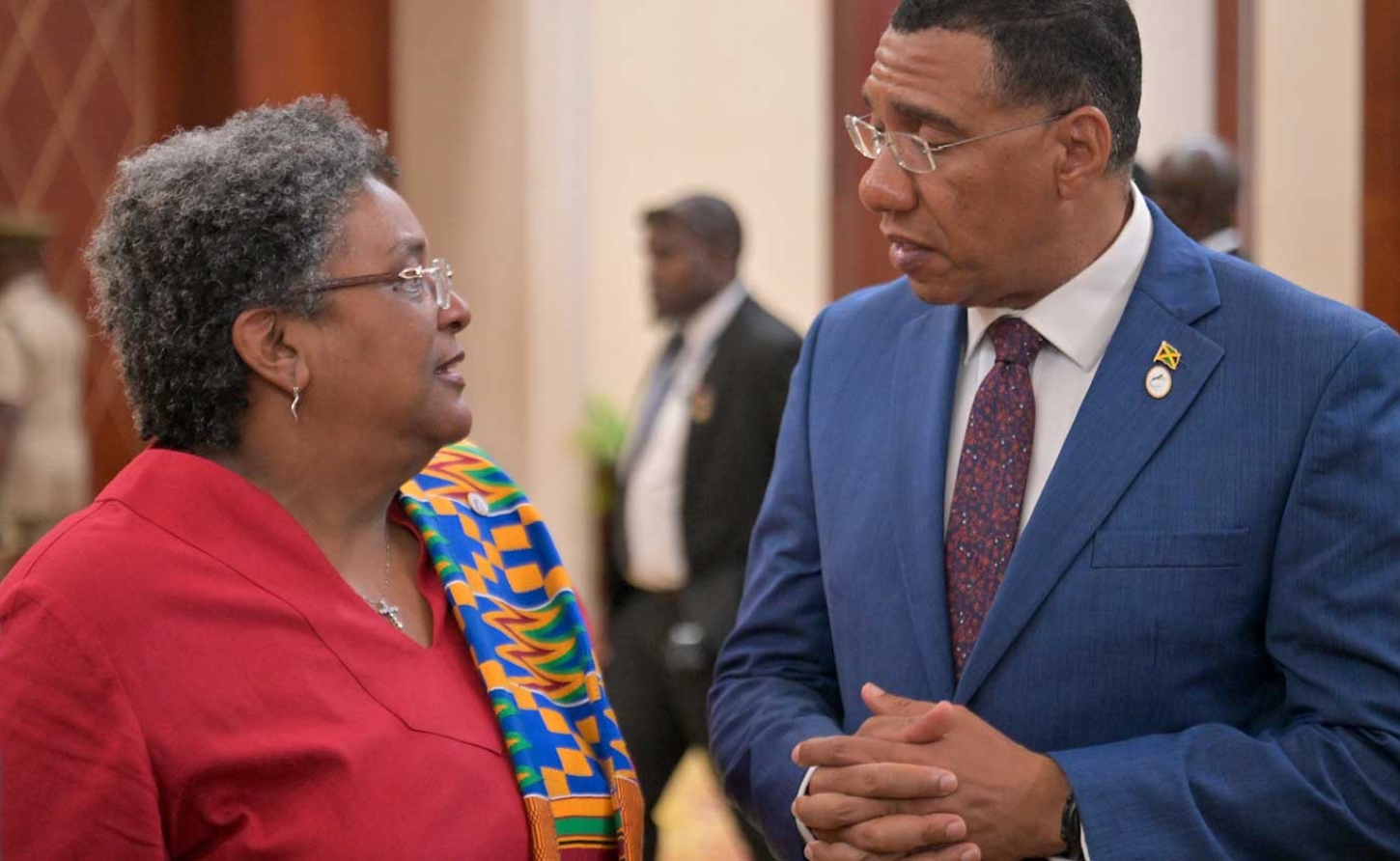 Barbados Prime Minister Mia Amor Mottley in discussion with Jamaica's Prime Minister Andrew Holness