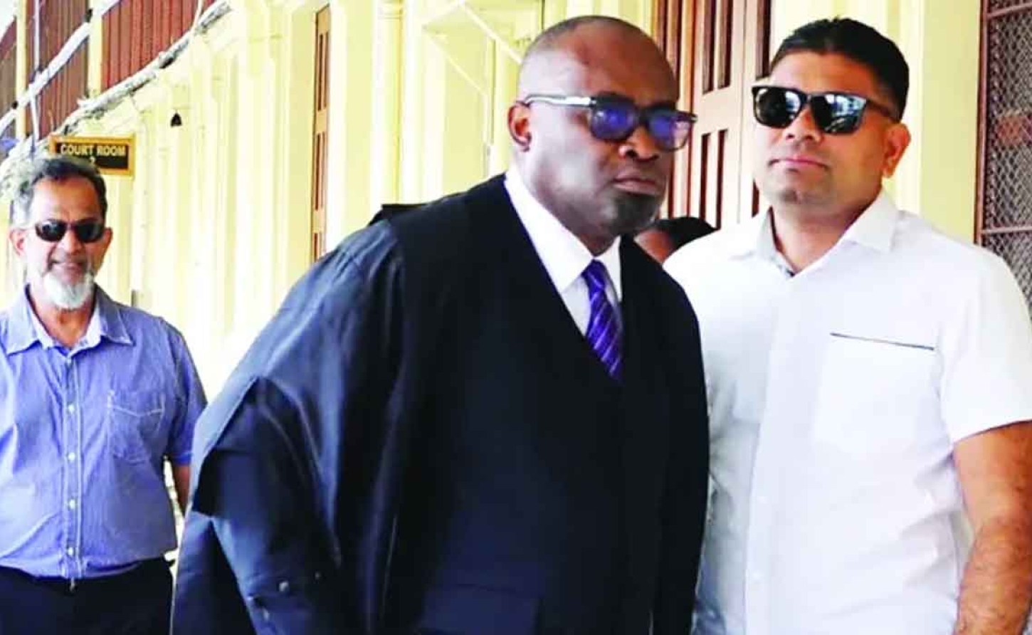 Senior Counsel Roysdale Forde and Azurddin Mohamed outside the court.