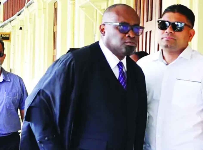 Senior Counsel Roysdale Forde and Azurddin Mohamed outside the court.