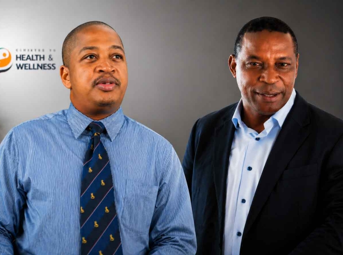 Neurosurgeon Dr. Roger Hunter (left), and UHWI’s chief doctor, Dr. Carl Bruce (right).
