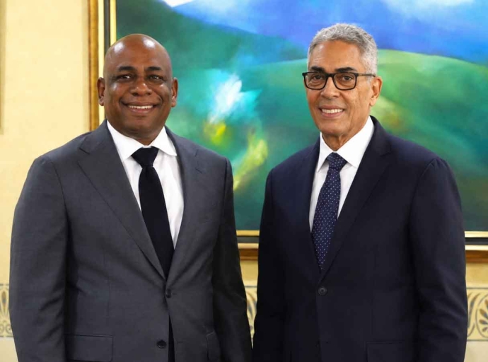 From left: Newly appointed Bank of Jamaica Governor, Dr Brian Langrin and outgoing BOJ Governor Richard Byles.