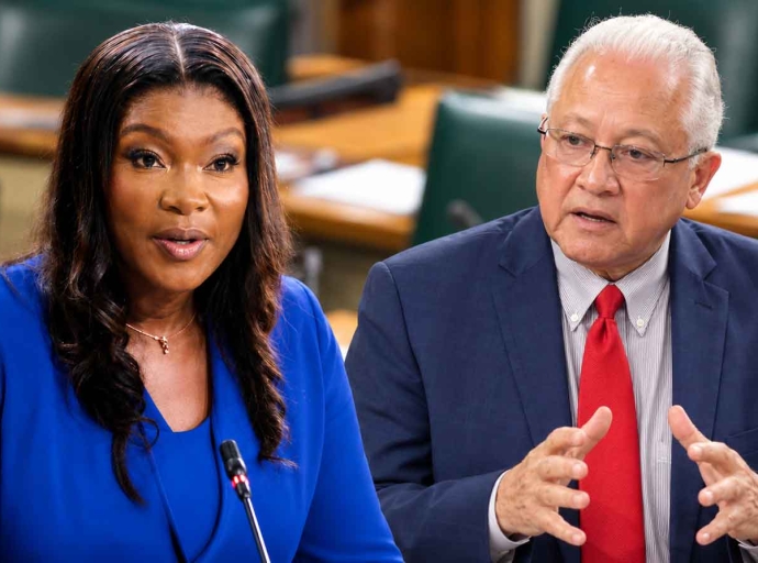 Opposition Spokesperson on Justice, Miss Zuleika Jess, MP and Minister of Justice Delroy Chuck 