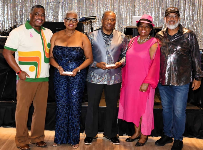 Jamaica’s Honorary Consul to Atlanta, Dr. Elaine Bryan (second right), shares a light moment with, from left, Dr. Joseph Dove, Dr. Yvonne Smith Blake, CEO of the Montego Bay-Atlanta Cities Committee, Dr. Christopher Parker, research associate professor and director of population and global health at the Georgia Health Policy Center at Georgia State University, and JCJ President Junior Taylor at the organization’s annual fundraising event, All Schools Jamm, held at the Atlanta Marriott Marquis on Saturday, Oct. 10. Smith Blake and Parker received JCJ’s Contribution to the Culture Award. (Derrick Scott photo)
