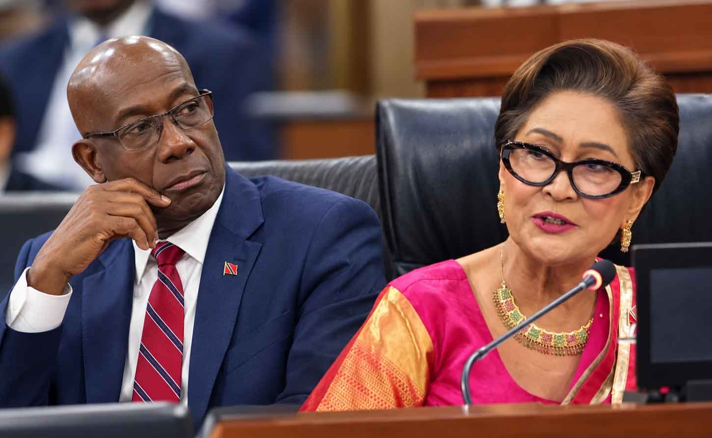 Image Illustrates former T&amp;T Prime Minister Dr. Keith Rowley and Prime Minister Kamla Persad Bissessar.
