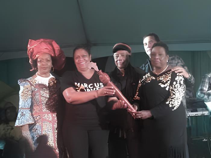 Culture Minister Olivia "Babsy" Grange at a Sam Sharpe Commemoration ceremony at Tulloch Castle. At far left is Social Historial Professor Verene Shepherd; Dr. Hillary Brown  in charge of culture at the Caribbean Community Secretariat, CARICOM; Then MP Mr. Derrick Kellier and then Mayor of Montego Bay Mr. Homer Davis. 