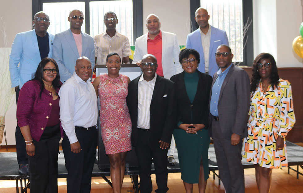 Falmouth’s Mayor Colin Gager (centre) and Assembly District Leader Ms Saran Purcel along with Councillor for the Falmouth Division Garth Wilkinson, and Councillor for the Martha Brae Division  Roydell Hamilton (third from left in the back row) pose for a photograph with the members of the Board of the Friends of Falmouth organization. | Derrick Scott Photo