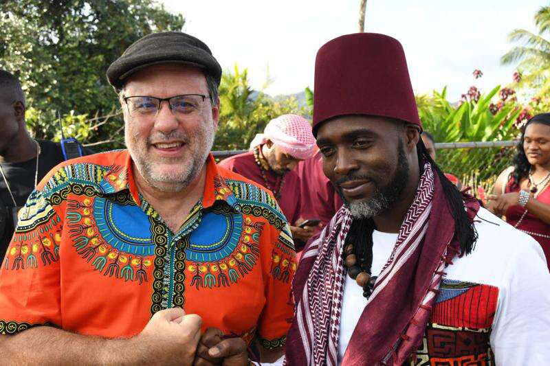 People's National Party President Mark Golding engages leader of the Accompong Maroons in St Elizabeth, Richard Currie at last Friday's January 6 commemoration of the Accompong Maroon's 285th anniversary of the signing of the peace treaty with the British. | Joseph Wellington Photo 