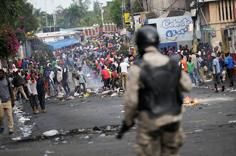 Protesters demanding the resignation of the President in Port-au-Prince.Credit (Courtesy Reuters by Andres Martinez Casares)