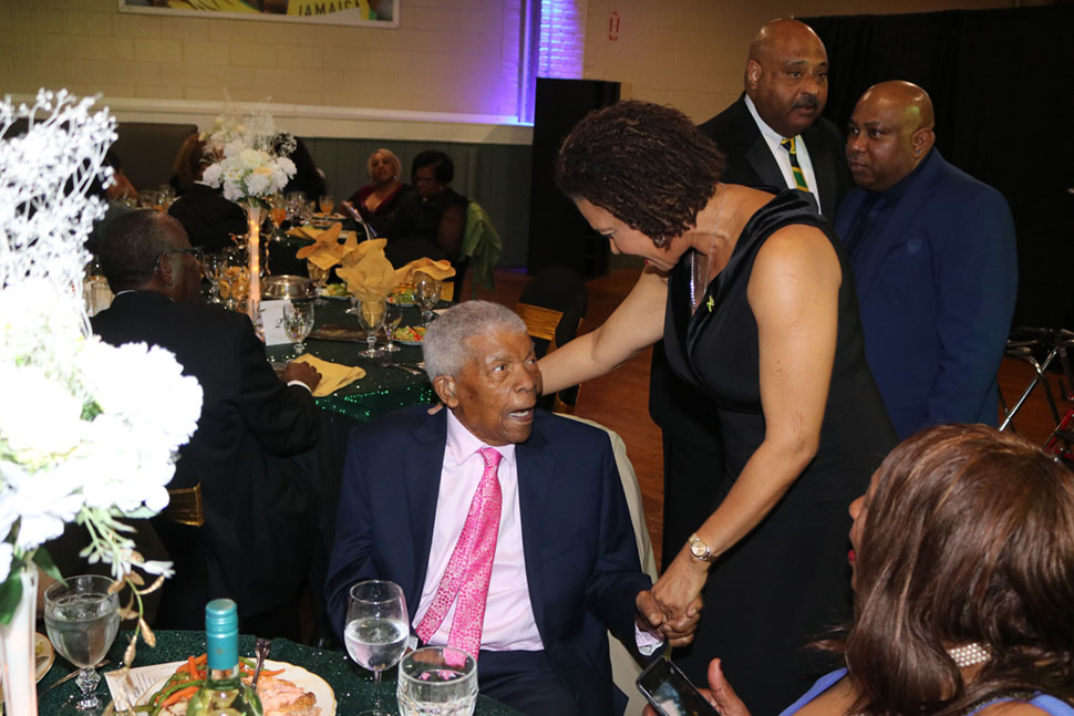 Jamaica’s Ambassador to the United States Audrey Marks Her Excellency Audrey Marks as she greets 101 year old Jamaican Kenneth Bennett snr , the only surviving foundation member of the West Indian Social Club of Hartford, Connecticut, at the 74th Anniversary gala of the West Indies Social Club of Hartford, Connecticut on April 20, 2024 at the club’s main street complex in Hartford.