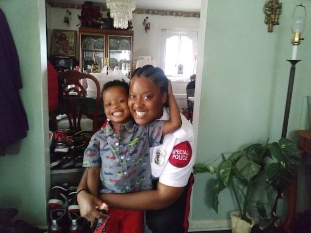 Special Police Officer Maurica Manyann and her four year old son in happier times.