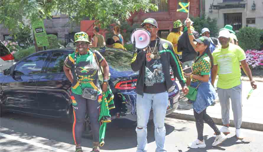 Jamaican entertainer Mr. Vegas, took centre stage in front of the Jamaican embassy in Washington, as he lashed out at PNP leader Mark Golding and MP Julian Robinson, for their family's constitutionally accepted citizenship in the commonwealth, as well as the Opposition PNP, instead of promoting Brand Jamaica as he promoted in his video.| Photos by David. C. Welsh 