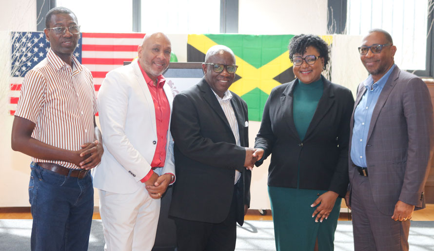 Falmouth’s Mayor His Worship Councillor Colin Gager received a warm welcome from Assembly District Leader Saran Purcel. Sharing in the occasion are  from left, Councillor for the Martha Brae Division  Roydell Hamilton, President of the Friends of Falmouth Michael Watkiss, Councillor for the Falmouth Division Garth Wilkinson.| Derrick Scott Photo