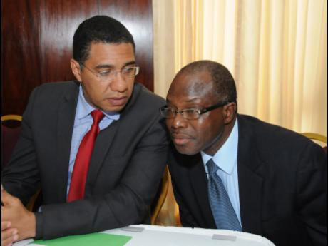 Prime Minister Andrew Holness has words with MP Ecerald Warmington.