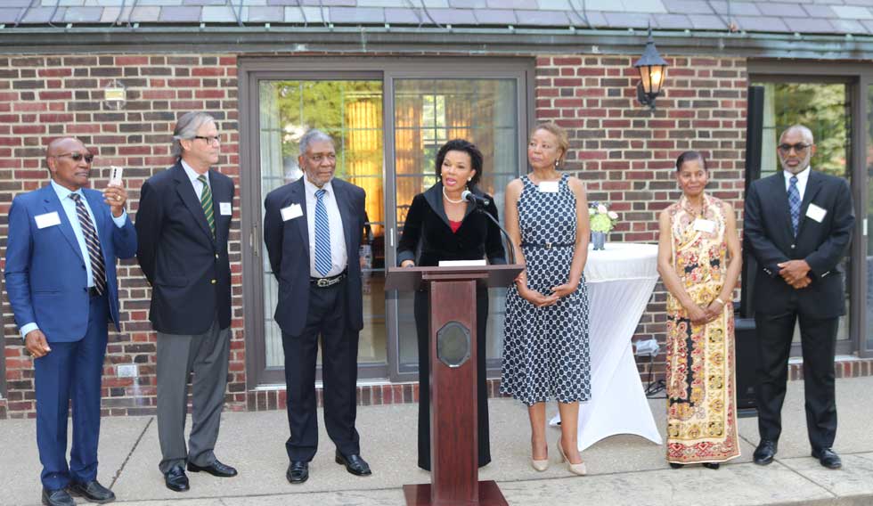 Jamaica's Ambassador to the United States Audrey Marks addresses the signing ceremony of a Memorandum of Understanding between the University of the West Indies, UWI,  and the State University of New York at Buffalo, SUNY, have signed a memorandum of understanding,MOU, to help achieve the United Nations 2030 Sustainable Development Goals and to facilitate programmes to foster and develop cooperative relationships between both universities. She is flanked from left by Dr. Rudolph Willis of NAJASO, SUNY Board member Mr. Bill Pierce, NAJASO Board Chair Dr. Richard Constable, NAJASO Secretary Ms Beverly Morris, NAJASO President Dr. Joyce EL Ali, and President of the Jamaica Buffalo and America Association, Mr. Garth Gibbs. Ambassador Marks paid tribute to these persons as the conceptualizers of the programme.