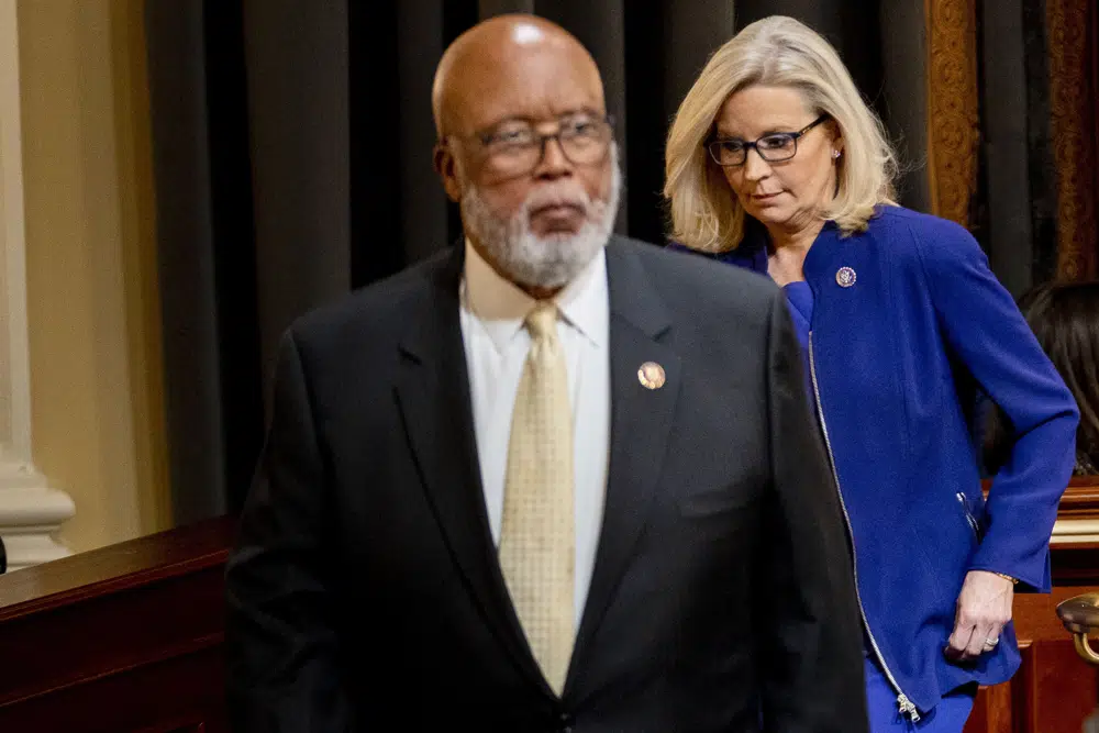 Committee chairman Rep. Bennie Thompson, D-Miss., left, and Committee Vice Chair Rep. Liz Cheney, R-Wyo., right, arrive as the House select committee investigating the Jan. 6 attack on the U.S. Capitol prepares to hold its final meeting on Capitol Hill in Washington, Monday, Dec. 19, 2022. (AP Photo/Andrew Harnik, Pool)