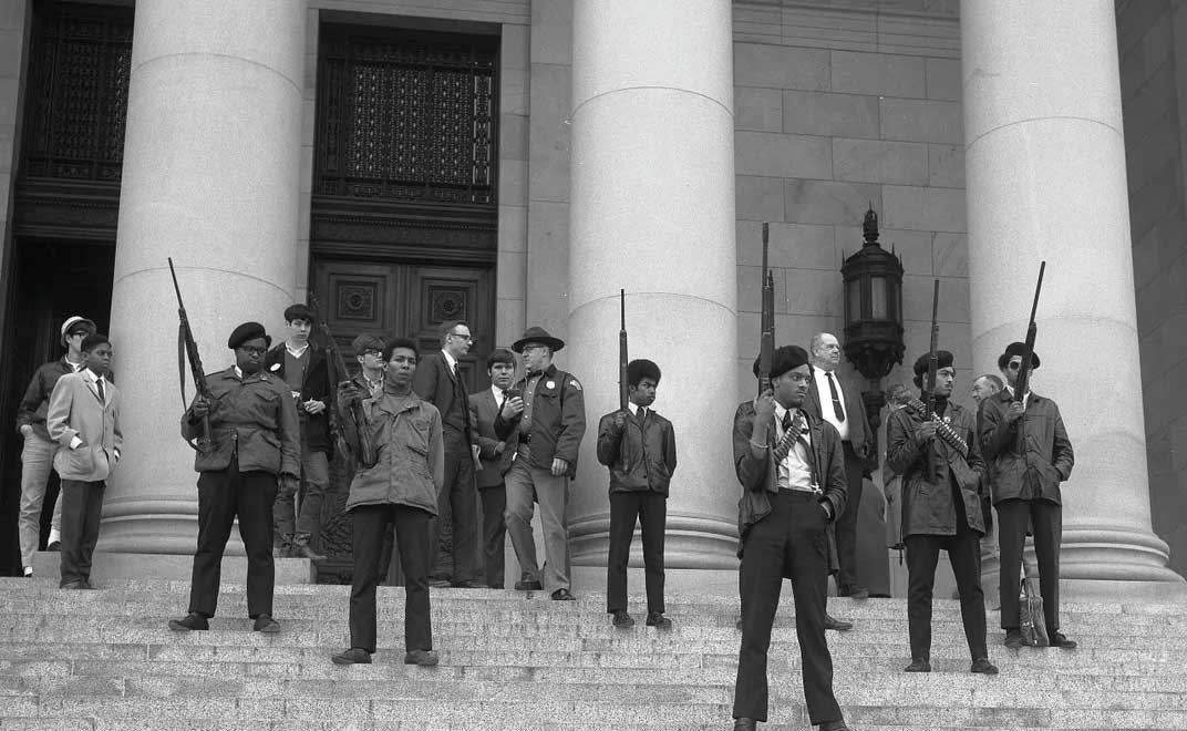 Members of the Black Panther Party demonstrating in the Capitol.