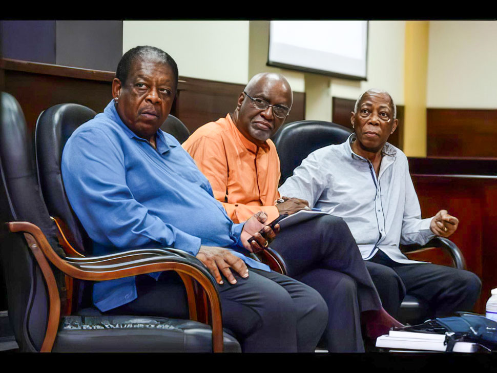 Eminent legal luminaries: from left: From left: Former president of the Caribbean Court of Justice Sir Dennis Byron; Former judge of the International Court of Justice, Patrick Lipton Robinson; and author and former justice minister and attorney general of Jamaica, AJ Nicholson, listen attentively during the launch of the book, The Roadblock: Jamaica’s Resistance to the Caribbean Court of Justice, at the Faculty of Law, University of the West Indies, Mona. 