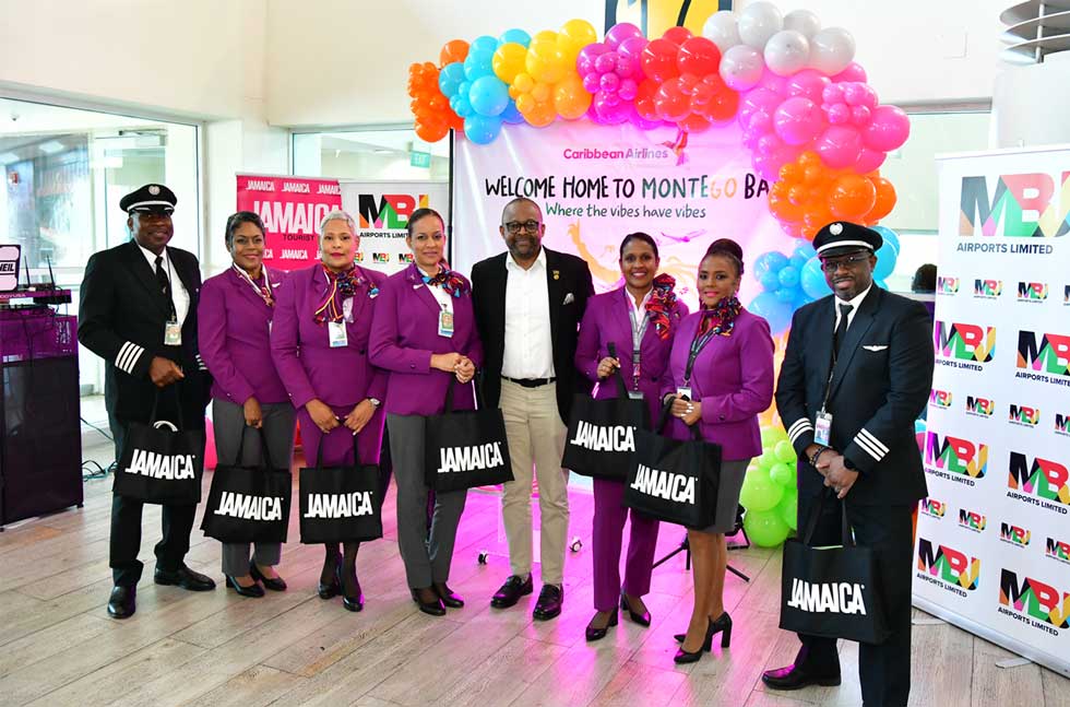 Caribbean Airlines crew members at the reception ceremony for the resumption of Caribbean Airlines daily service to Montego Bay on Tuesday. 