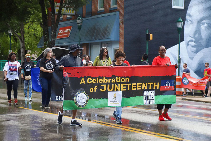 Chattanoogans celebrated Juneteenth on Monday, parading down M.L. King Boulevard before settling at Miller Park for a gala celebrating hip-hop history.