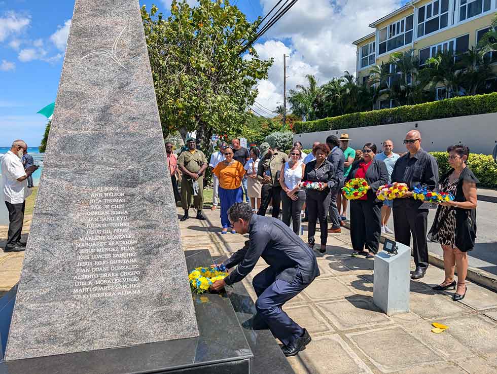 Ambassador David Comissiong lays a wreath at the memorial to those who died on October 6, 1976 in the Cubana airline tragedy over Barbados.