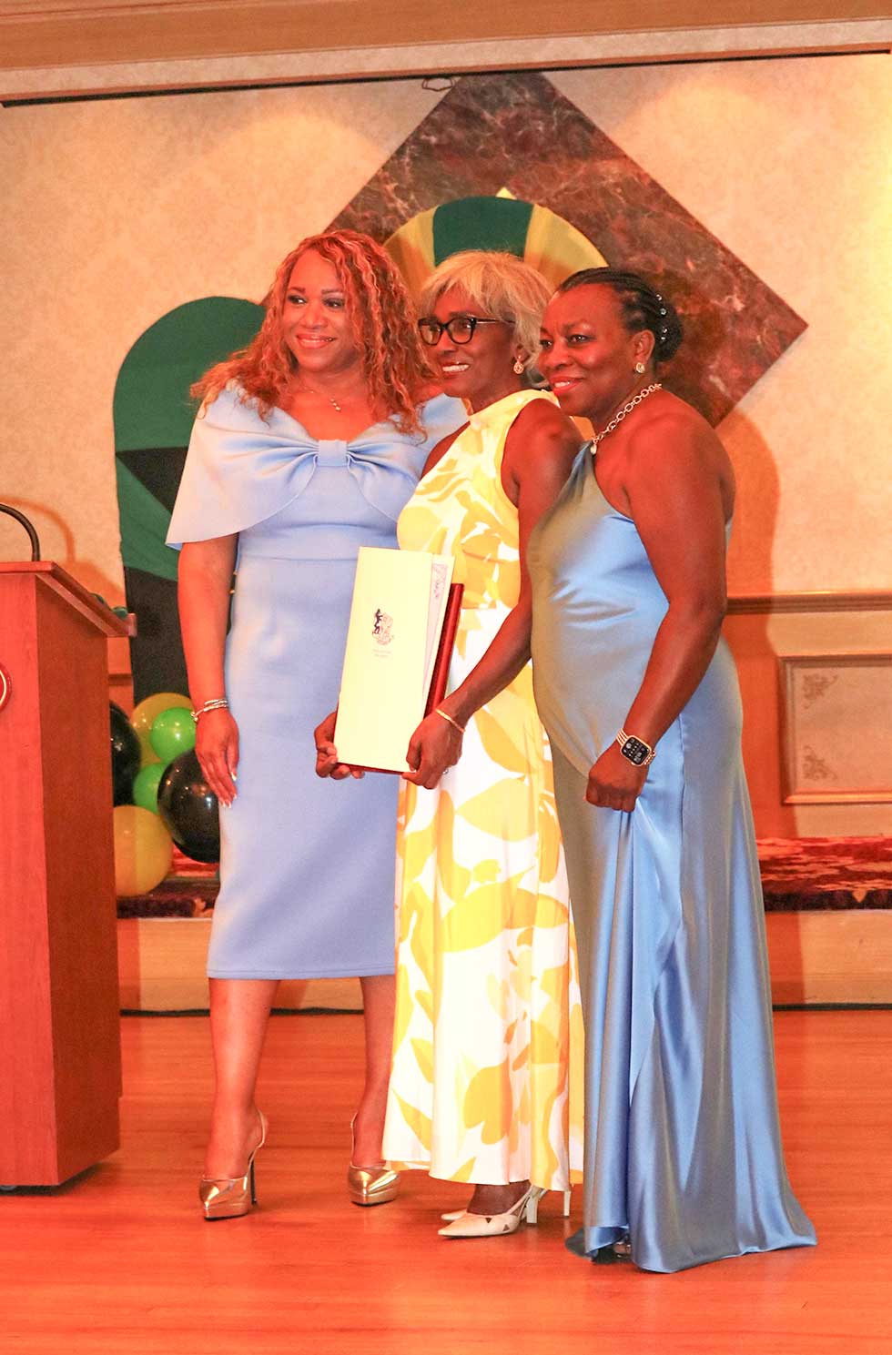 Jacqueline Lewis health and community service awardee center is flanked by Highland Park Mayor Elsie Foster left and Valerie Bailey, President of the JON-J Board of Trustees| Derrick Scott Photo