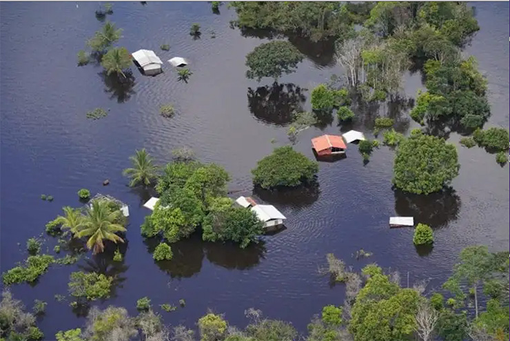 Flooding low lying coastal areas of Guyana, June 2021