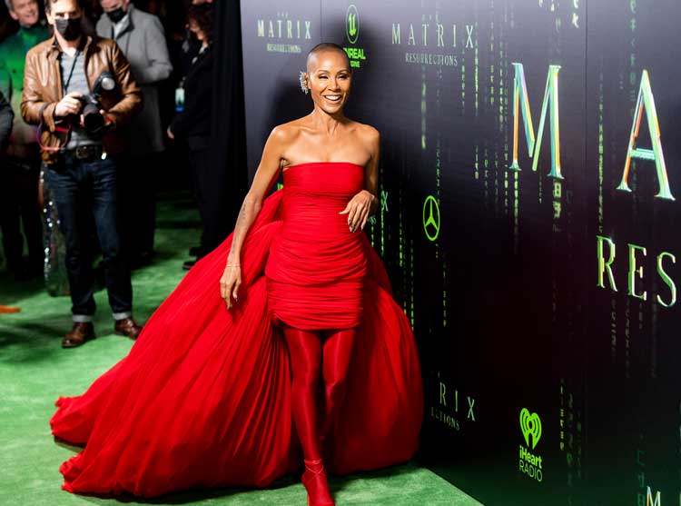 Black women have been fighting for decades for the right to wear their natural hair. Here Jada Pinkett Smith arrives at the premiere of ‘The Matrix Resurrections’ on Dec. 18, 2021, in San Francisco. (AP/Noah Berger)