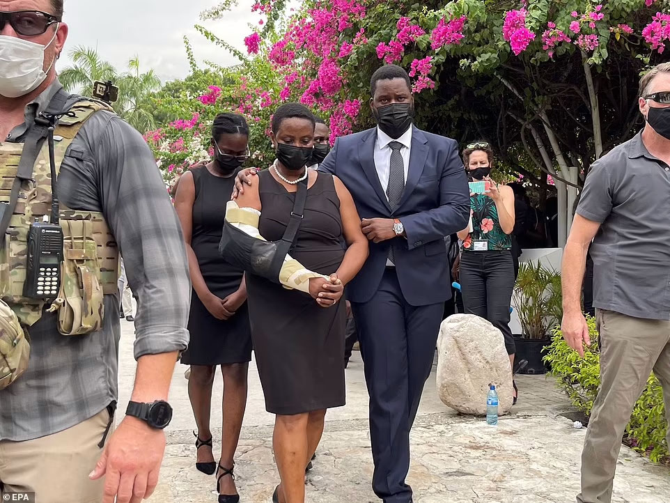 Haitian former first lady Martine Moise seen in sling at tribute for assassinated president Jovenel Moise. She has now been implicated in the assassination of her husband  Jovenel Moise.