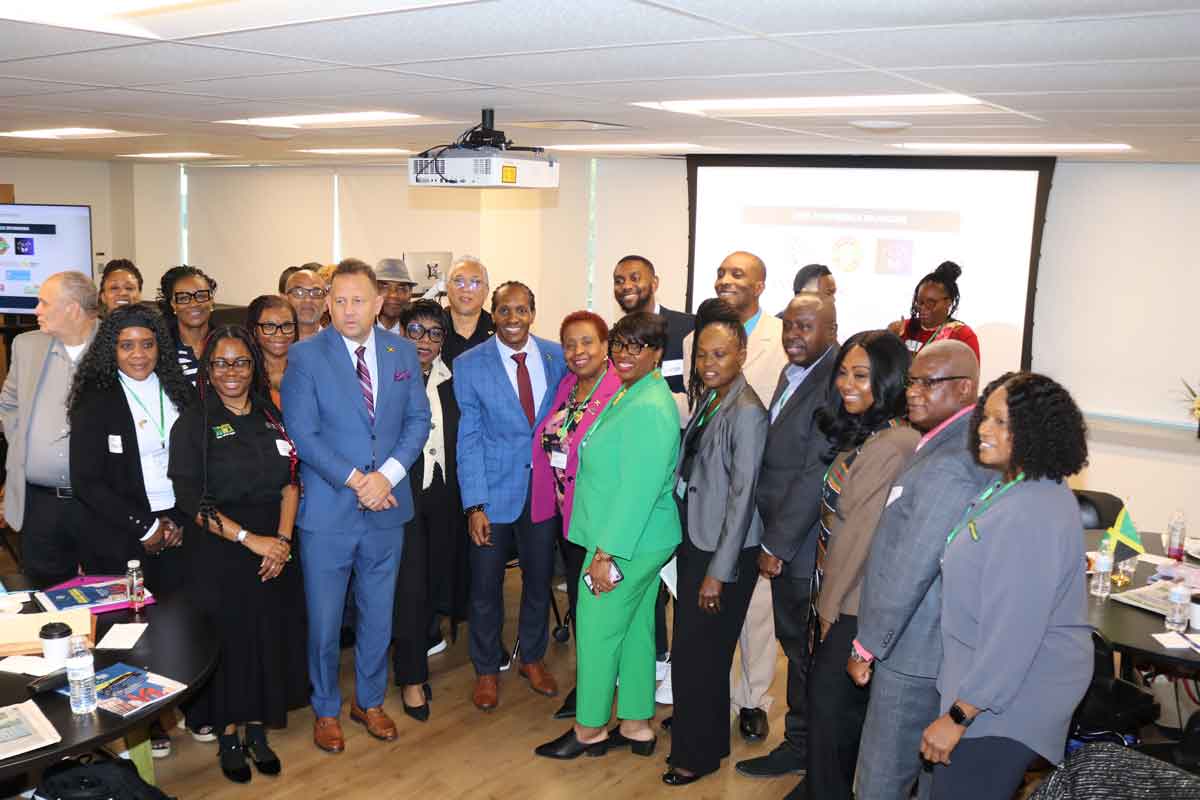 Minister of State in the Ministry of Foreign Affairs and Foreign Trade Hon Alando Terrelonge engages with delegates at the town hall meeting at the second Jamaica Diaspora Northeast USA Conference at Temple University in Philadelphia on Saturday, October 24 .2026. Photo Derrick Scott.