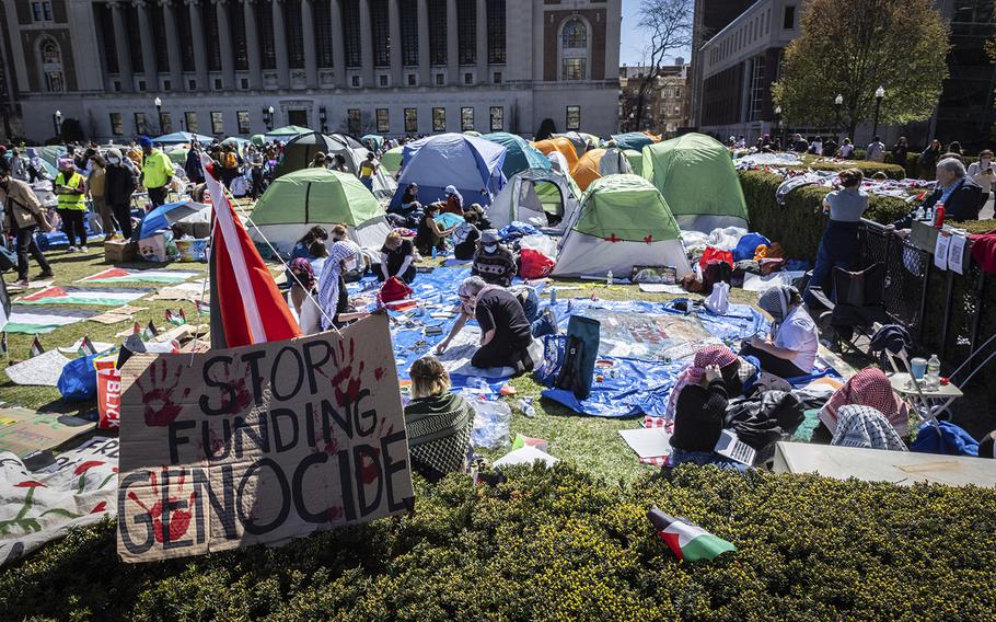  A sign sits at the pro-Palestinian demonstration encampment at Columbia University in New York on April 22, 2024. (Stefan Jeremiah/AP)  - Students at a growing number of U.S. colleges are gathering in protest encampments with a unified demand of their schools: Stop doing business with Israel — or any companies that support its ongoing war in Gaza.  