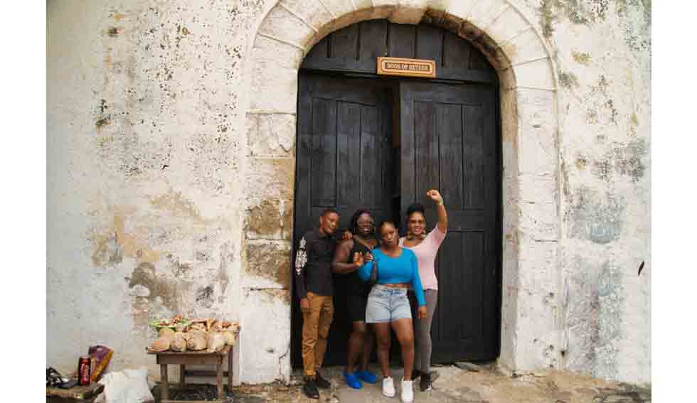 At the renamed "Door of Return" following an emotional tour of the departure points for those African survivors who were captured and sold into chattel slavery from the Cape Coast Castle and the revelation of what they endured to render their decendants whith having the DNA of the most resilient people on earth.