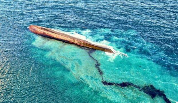 capsized oil tanker off the Tobago coast spilling hundreds of barrels of oil.