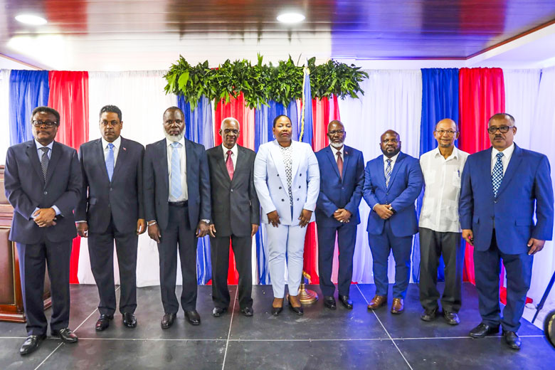 Presidential Transition Council (CPT) members, from left to right: Fritz Alphonse Jean; Laurent Saint-Cyr; Frinel Joseph; President of the Council-Edgard Leblanc Fils; Regine Abraham; Emmanuel Vertilaire; Smith Augustin; Leslie Voltaire and Louis Gerald Gilles, pose for a group photo after a ceremony to name its president and a prime minister in Port-au-Prince, Haiti, Tuesday, April 30, 2024. Odelyn Joseph/AP 