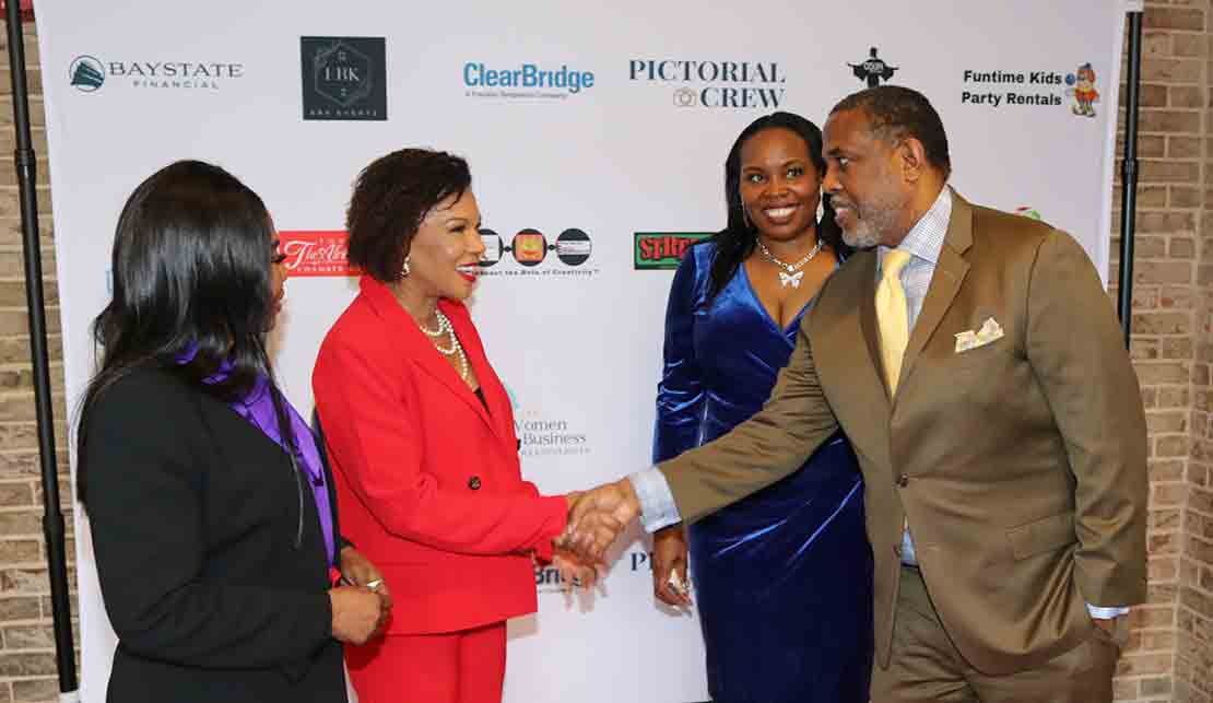 Jamaica's Ambassador to the United States, Her Excellency Audrey Marks receives a warm welcome from New York State Senator Kevin Parker on her arrival at International Women’s Conference to deliver the keynote address at Hofstra University in Hempstead, New York on Saturday March 9th, 2024. Looking on from left to right at Jamaica’s consul general in New York, Alsion Wilson, and   Dr. Neva Alexander, Chief Executive Officer, Neva Alliance. (Photo Derrick Scott).