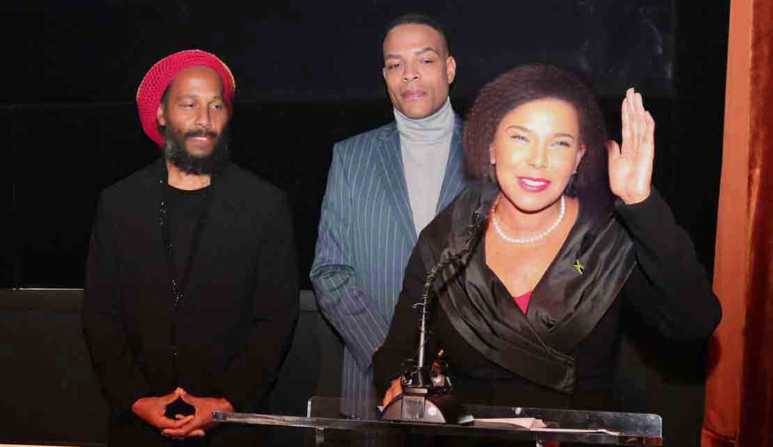 Jamaica’s Ambassador to the United States Audrey Marks, delivers remarks at a special screening of the   BOB MARLEY: ONE LOVE film at the Motion Pictures Association in Washington, on Tuesday February 13. Looking on are Ziggy Marley, son of Bob Marley,  and Director of the BOB MARLEY: ONE LOVE film Reinaldo Marcus Green.(Photo Derrick Scott)